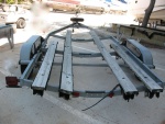 Trailer, as purchased.  Boat was stored indoors on a rack; trailer was left outside to fend for itself.  I should post an 