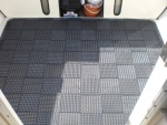 Rubber multi-deck floor in cockpit.