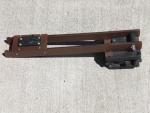 BBQ holder.  Made an arm, attached to a Scotty downrigger base.  Easily removed with one bolt and a wingnut.