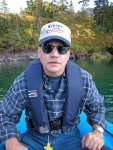 (AnchortownJim) Rowing the dingy ashore in Nellie Juan anchorage off of Derickson Bay