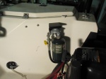 Propane supply, regulator, shut-off mounted in starboard splashwell