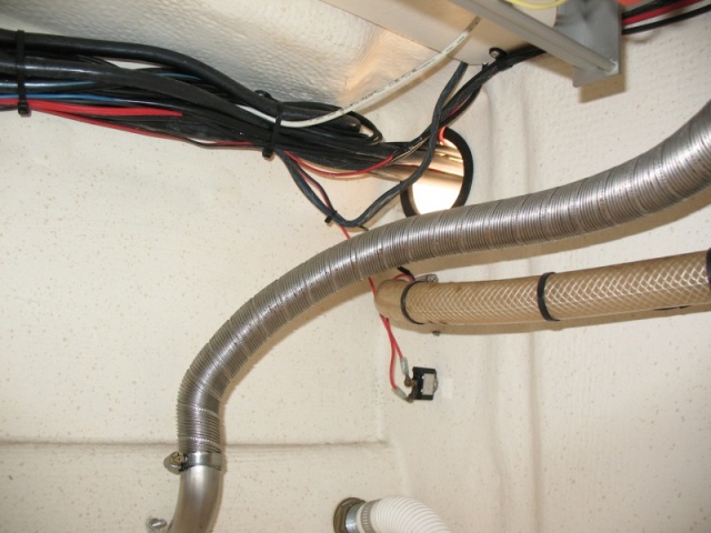 Under galley showing Wallas exhaust hose.