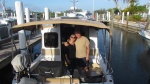 Jess and Mike Rizzo aboard their 27' Tug Illusions