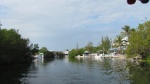 The canal leading in and out of the Pilot House Marina in Key Largo nice homes and boats.