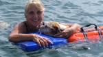 Ginny and Lucy taking a dip in Tarpon Bay along the intercoastal waterway along side of Key Largo