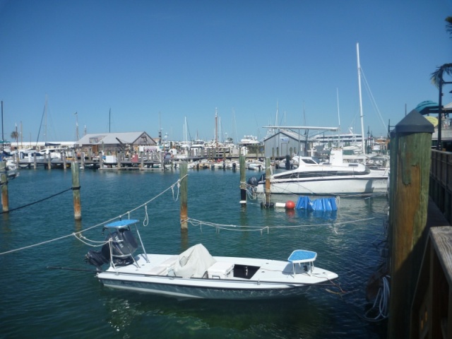 The dinghy dock in the rear of the photo Key West Harbor near Turtle Kralls Restaurant