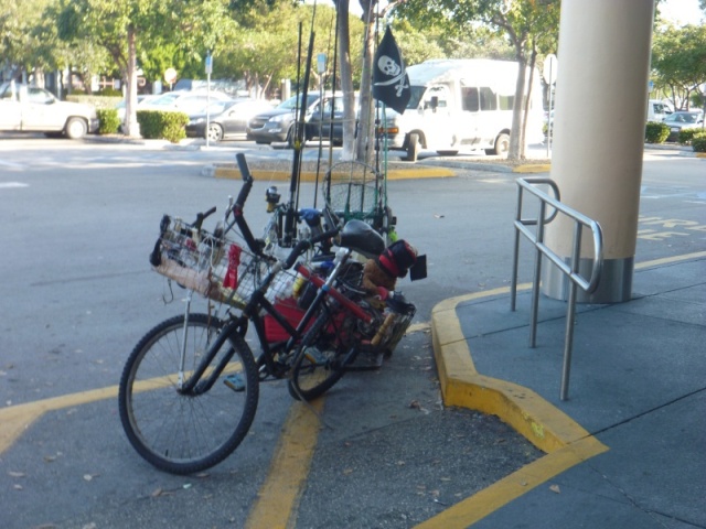 A local bicycle outfitted for fishing with attached trailer