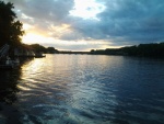 View looking up river from the boat house deck