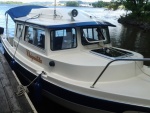 Chiquitita docked at the boat house