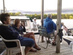 Fishing and conversation at the boat house