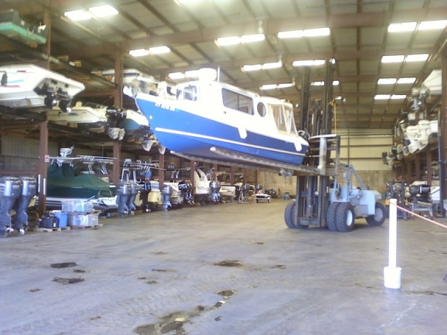 Good view of the Betty Ann being removed from the boat valet storage rack at Port Niantic