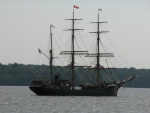 Passing astern, while on board the ferry, the tall ship, PICTON CASTLE, from Canada anchorded on the James River.