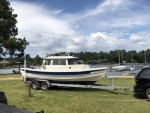 Boat w/ Lake Conroe in Background