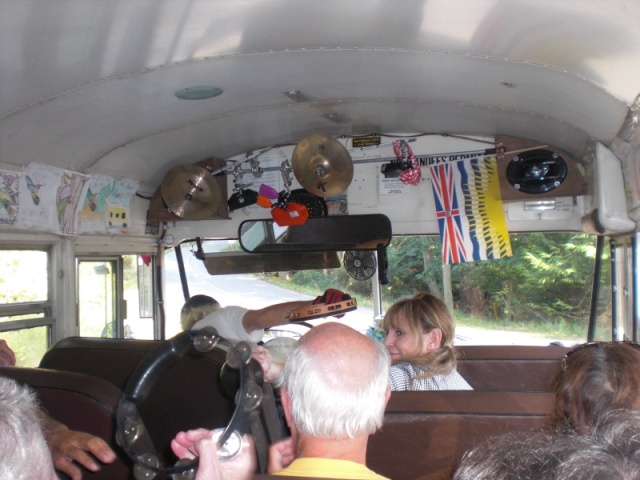 Our incredible driver, Tommy Transit, handing out musical instruments on the ride to the Hummingbird Pub, Montague Harbour. Shouldn't you have your eyes on the road Tommy?