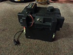 U1 size AGM with charger, 12v port, meter, and switched leads for alligator clamps.  We use this for charging RC gear.