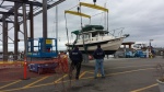 Sling launch at Edmonds Marina - March 2014