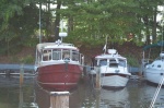 23 ft Venture next to 25 ft Ranger Tug