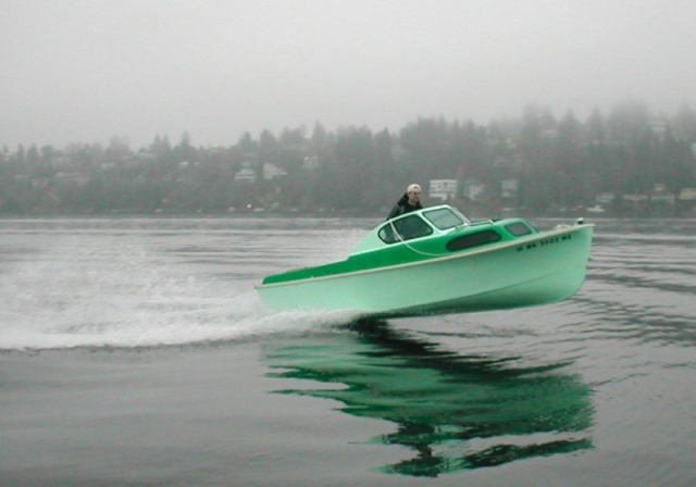 Boat #8 (2004-2008): 1956 Bell Boy 16 initially powered with just a single 25 hp Yamaha, as seen here jumping wake at Lk Washington in late 2004