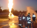 Big propane tank fire.  Stand back.  She's gonna blow!