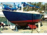 Steel boat I built early 1990\'s. Brent Swain 31 cutter.  Twin keel outboard rudder. 
