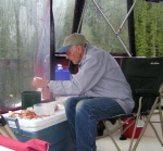 Dave Olson shelling crab at Claydon Bay 6-13-06