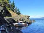 Beached on one of the many tiny coves on Lummi, Sunday evening June 14, waiting for the winds to die down before crossing Bellingham Bay. 
