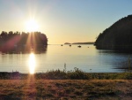 Sun setting over Fox Cove on Sucia Island, Saturday June 13, 2015.