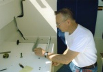 24 May 2005: Installing the hardware for the swivel seat.