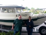 Mike & Helen with ClueZo our new boat!