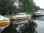 P1020346 The woman who was traveling on this C-Dory visited with us while we were locking thru. So sorry her name escapes me. They were hanging out on the lock wall for the night. The lock walls are almost always beautiful with lots of other boaters to share experiences with fun time