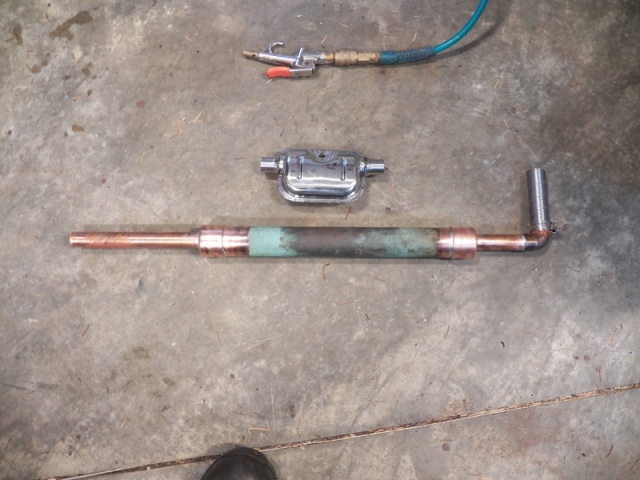 I bought a stainless muffler only to find out that it is not for inhabited space.  It is spot welded and not airtight, so it will not work for my application.  I made one out of some scrap copper plumbing pipe.  It is a glass pack style of muffler.
