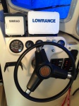 Beagle Helm with hydraulic steering, Lowrance Gen 2 touch, and Simrad autopilot.