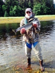 Brent with one of the fish he caught at Pleasant Bay, Admiralty Island.