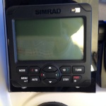 Simrad autopilot head AP24 integrated with chartplotter.