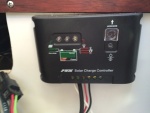 Solar controller for 100 watt solar panel that can be attached to cabin top.  I use this when no AC mains are available. It charges the battery of course.