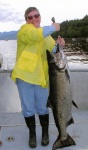 My sister with a fish.  (Trick photo: she's only 3 feet tall).