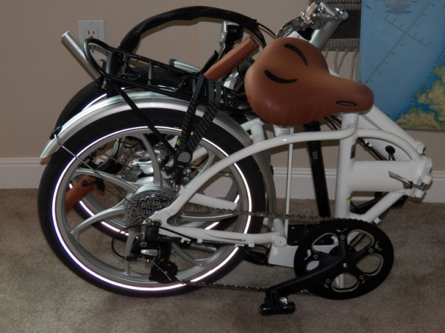 I am assuming that I won't need a dinghy because my boat is the size of a dinghy.  What might be nice is a grocery getter on shore.  This is a folding bike, not unusual for a boat.  What is unusual is that it is electric.  20 mph and a 30 mile range.  48# including battery.