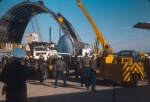 (March is best guess) 1966 - NAS So Weymouth, Mass Blimp Hanger dismantling with space capsule, Gemini, after retrieval being loaded for shipment.