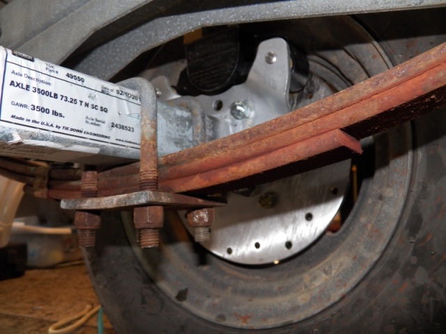 Very tight fit.  I had to bend some little stainless clips because they were interfering with the wheels.  I learned after reassembling that rusty leaf springs make for a rough ride because of 