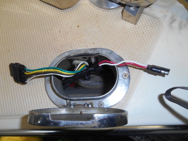 I would have preferred to use this port to add a second rode, but, alas, no room in the anchor locker.  I water proofed the port and added a connector for the remote anchor control and for 12v charge from the tow vehicle.