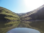 I poked into a few canyon bays to see if they would make good anchorages.  I was concerned that the wind might come up overnight.  That is cottonwood fuzz on the water.