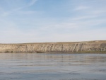 It's hard to get a feel for the size of the cliffs from a picture.  The trees at the base are 20 to 30 foot cottonwoods.