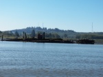 On a spit across from Aberdeen is a ruined wooden ship with only the skeletal frame and the steam boiler remaining.