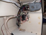 All of the electrical wiring just hangs loose on the back of the helm, which is in the V berth on the 16.  I've still got a few more modifications (like a negative buss bar) and then I need to cover it up.