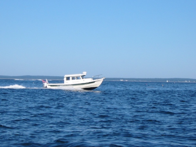 Hunky Dory leads the way to Christmas Cove where Captain John Smith put in on Christmas, 1614 