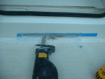 Slot cut for water to enter new bilge.