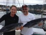 Two friends with their tuna.