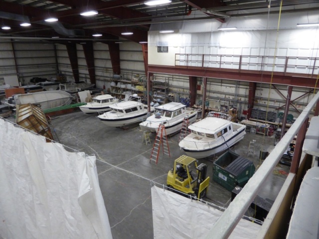Factory Tour 7-5-2016 - From Left to Right: A finished 22' Cruiser, an owner's Sea Sport at the Factory for some modifications, a new Tom Cat 25 nearing completion, and a new Sea Sport nearing completion.