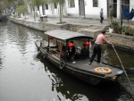 (rogerbum) Dory in Zhujiajiao (a village 30 miles outside of Shanghai).  I estimate that's a 1/4 horse outboard...