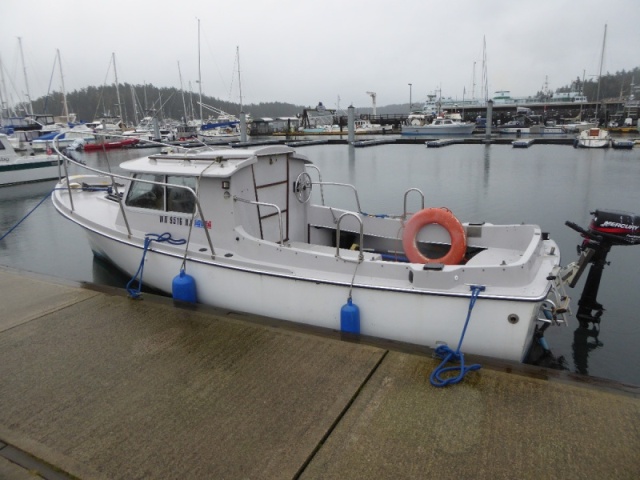 Not sure what kind of boat this is, but looks seaworthy enough to cruise anywhere in the world!